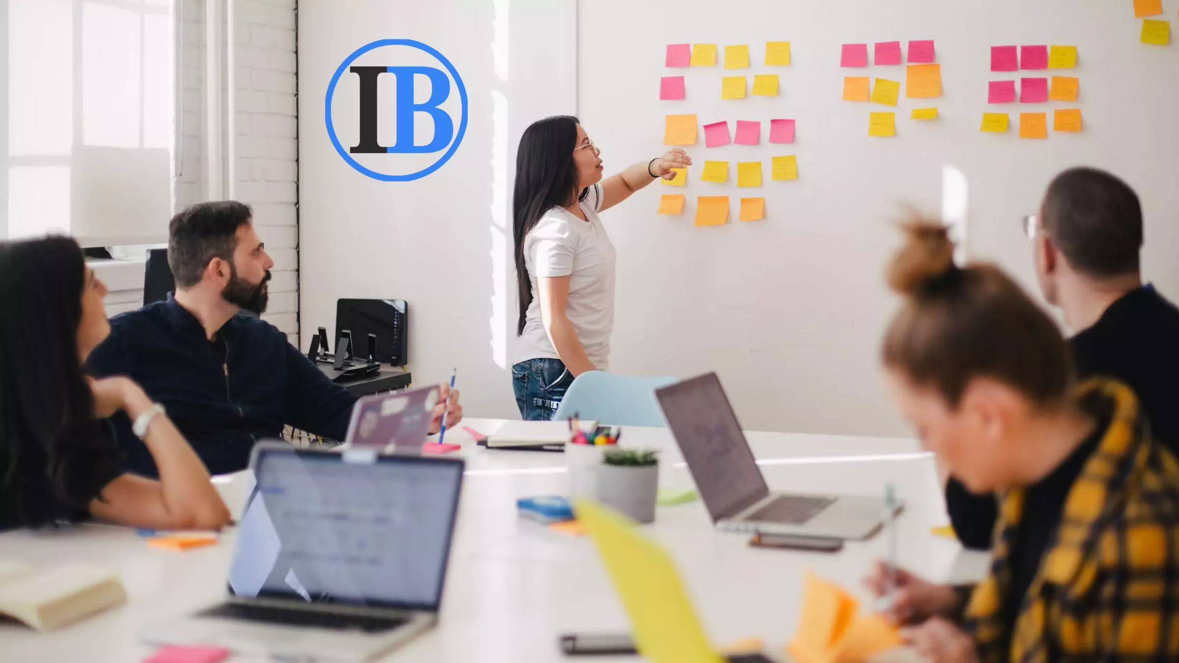 A developer working on multiple screens.